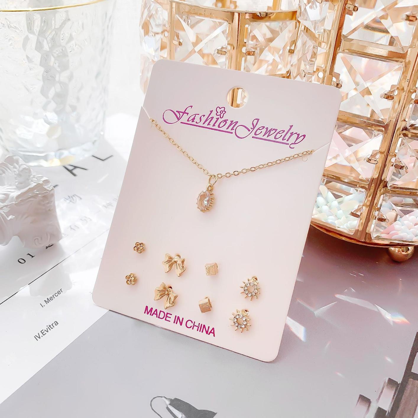 Electroplated gold necklace display