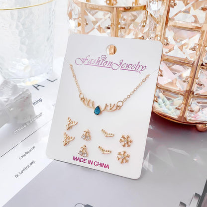 Gold crystal necklace with moon design