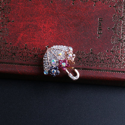 Elegant Rhinestone Umbrella Brooch front view