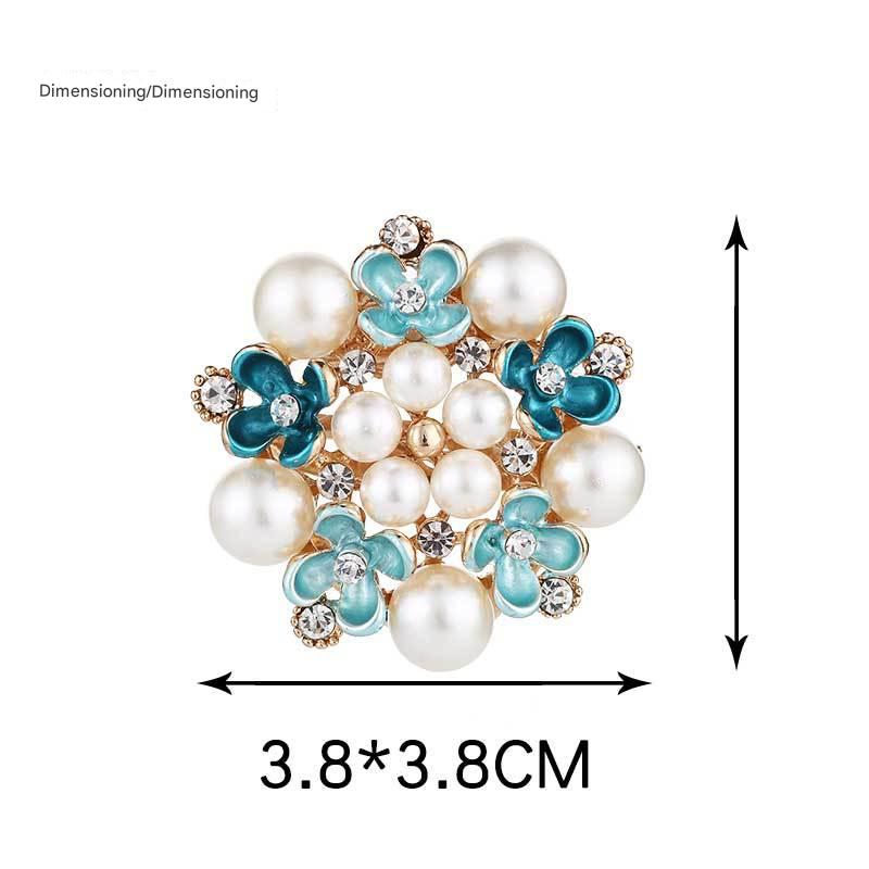 Elegant brooch displayed on fabric - Image 9