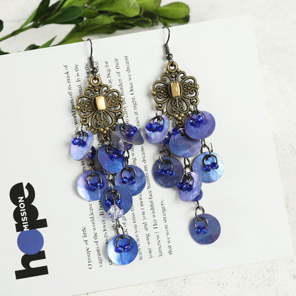 Colorful long tassel earrings displayed