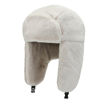 Stylish winter earflap hat on outdoor background