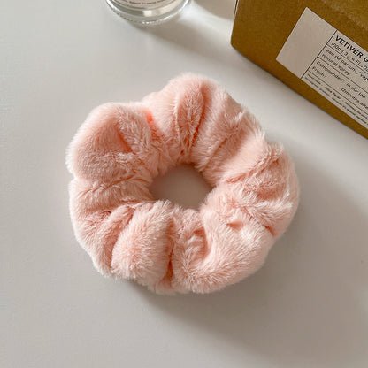 Winter-friendly hair band for children in beige