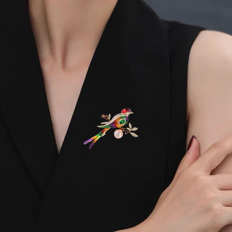 Magpie jewelry worn on a woman's dress