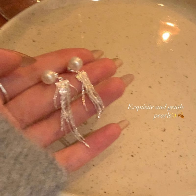 Elegant pearl earrings on display 4
