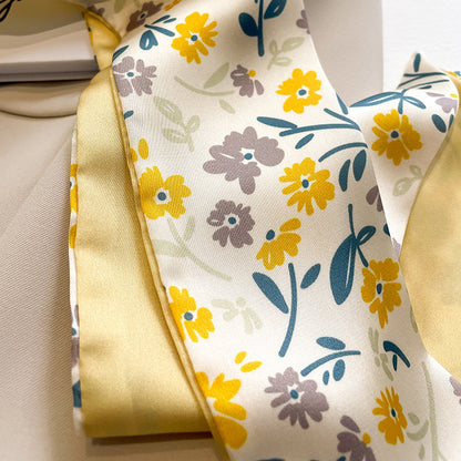 Close-up of multi-functional yellow scarf