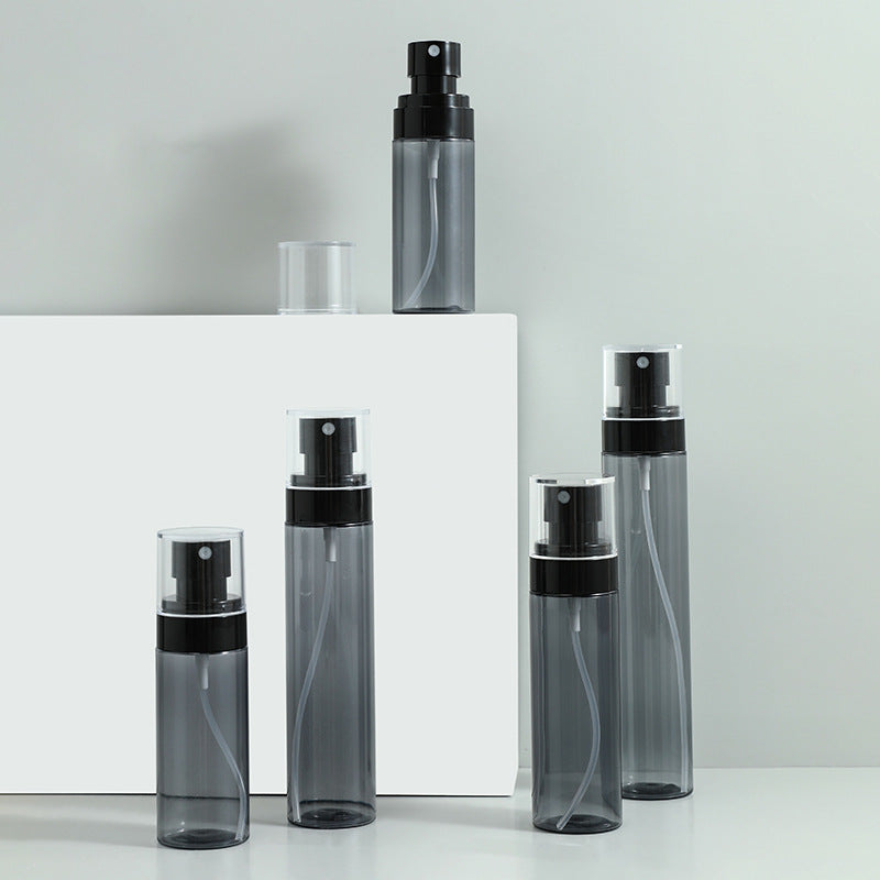 Compact travel spray container