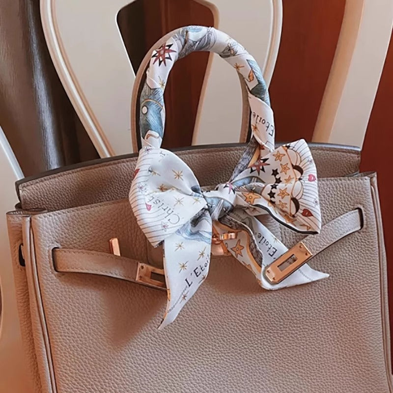 Detailed view of scarf fabric and print - Image 6