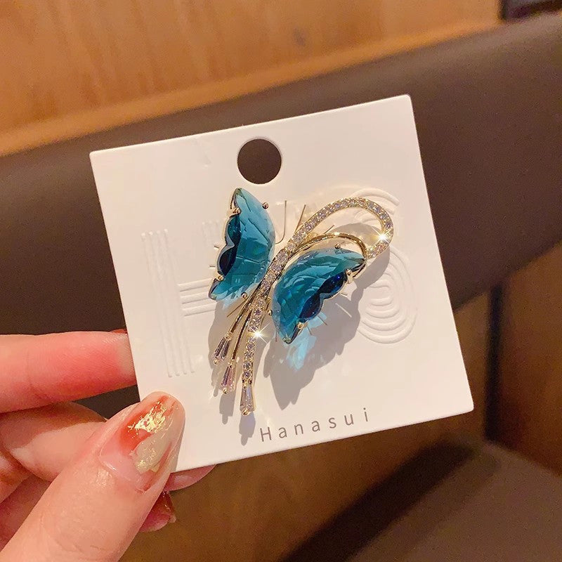 Butterfly brooch with tassels on model image 3