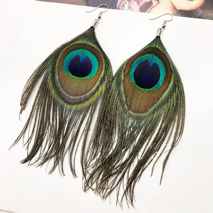 Lightweight long earrings worn by a fashion model