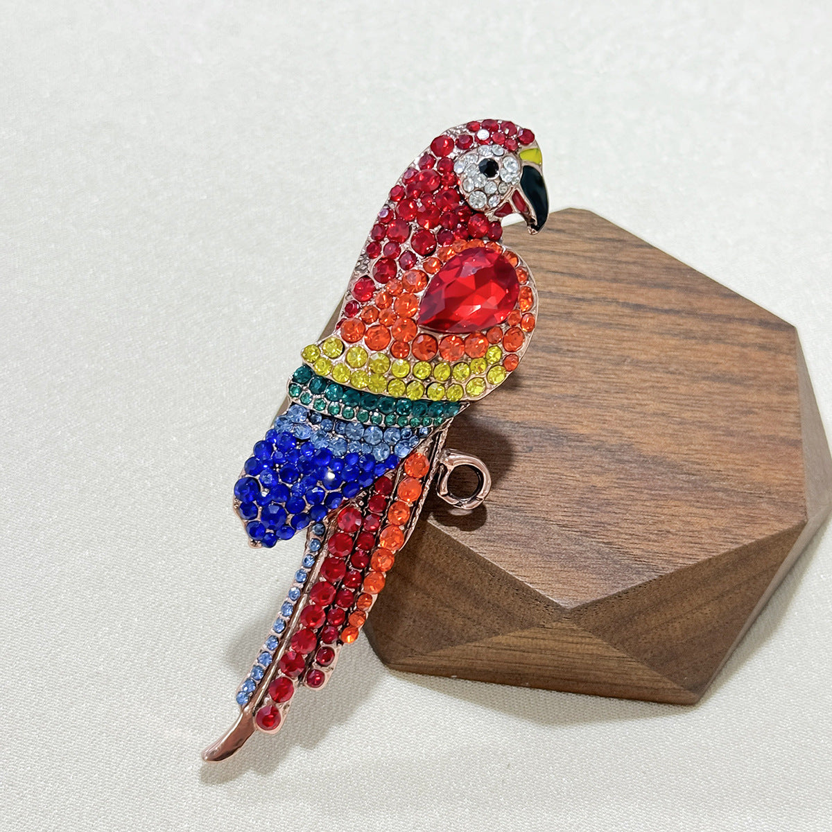 Vintage parrot brooch on a jacket