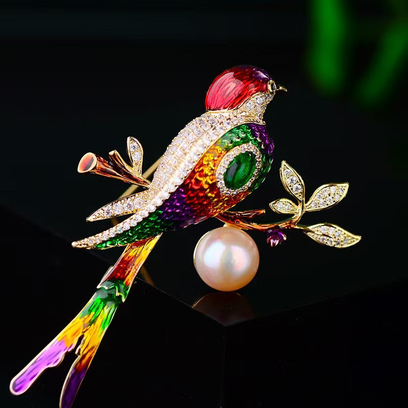 Chic Enamel Magpie Brooch displayed on fabric
