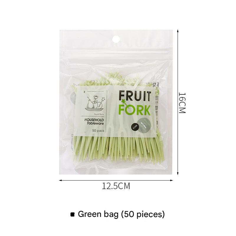 close up image of colorful disposable forks