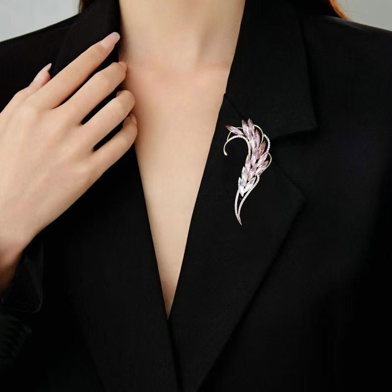 Floral brooch detail on women's coat