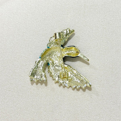 Retro style bird lapel pin