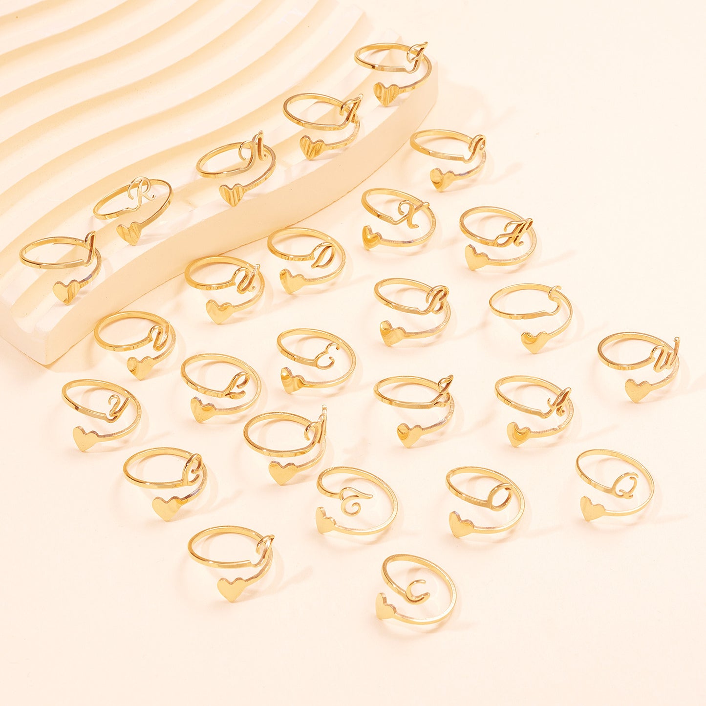 Stainless steel adjustable letter ring in unique heart design