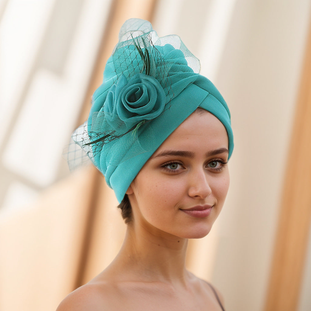 Muslim cap on a table with accessories