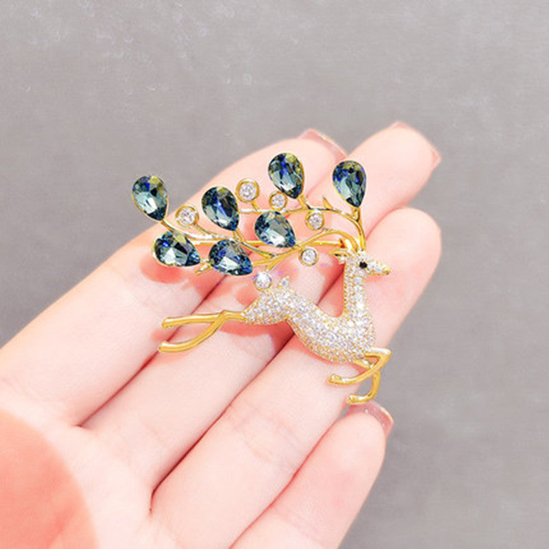 Blue crystal deer brooch front view