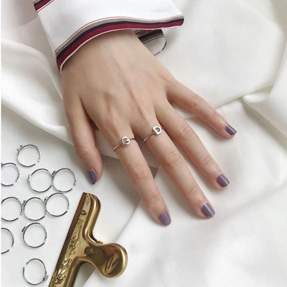 Stylish couple wearing Alphabet Rings 3