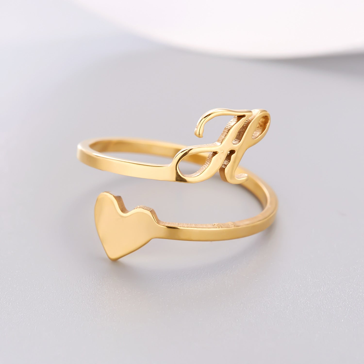 Stainless steel adjustable letter ring in unique heart design