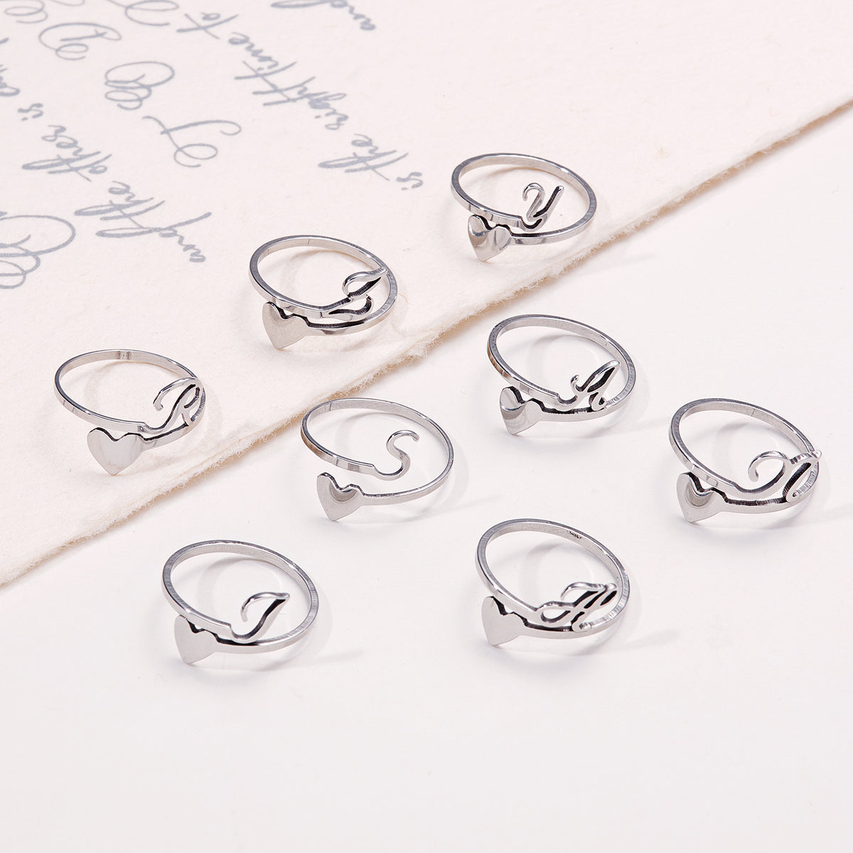 Stainless steel adjustable letter ring in unique heart design