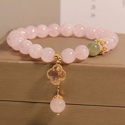 Four leaf clover pendant on pink quartz