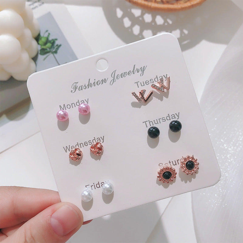 Korean pearl bow earrings image 1