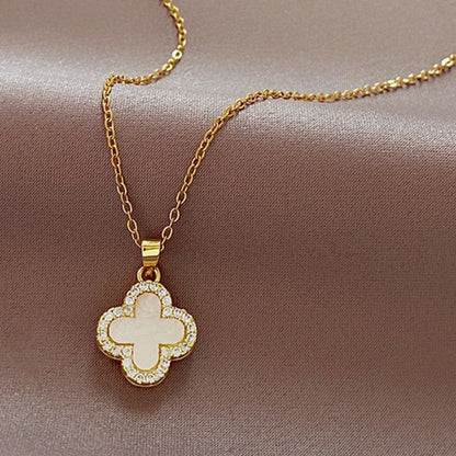 Elegant floral necklace hanging on display