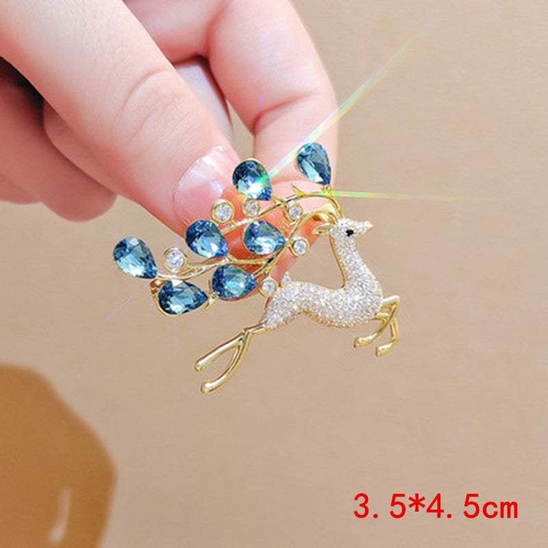 Blue crystal deer brooch front view