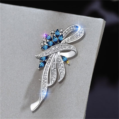 floral brooch with cat's eye stone