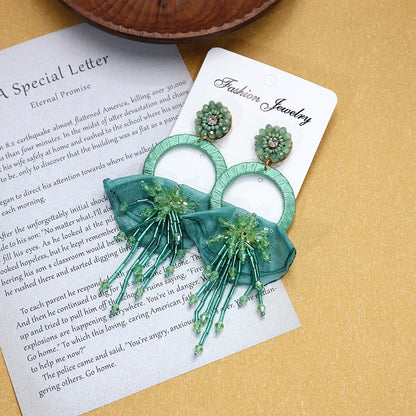 Intricate design detail of tassel earrings image 6