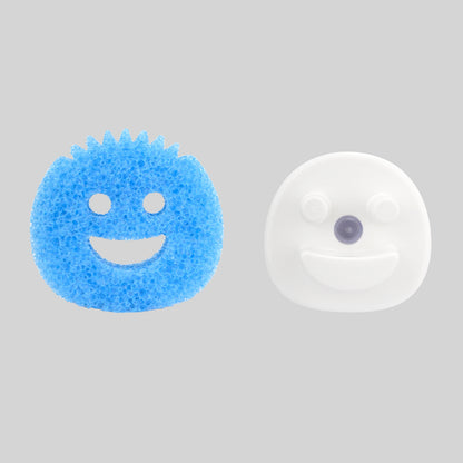 Smiling sponge cleaning pad on kitchen counter