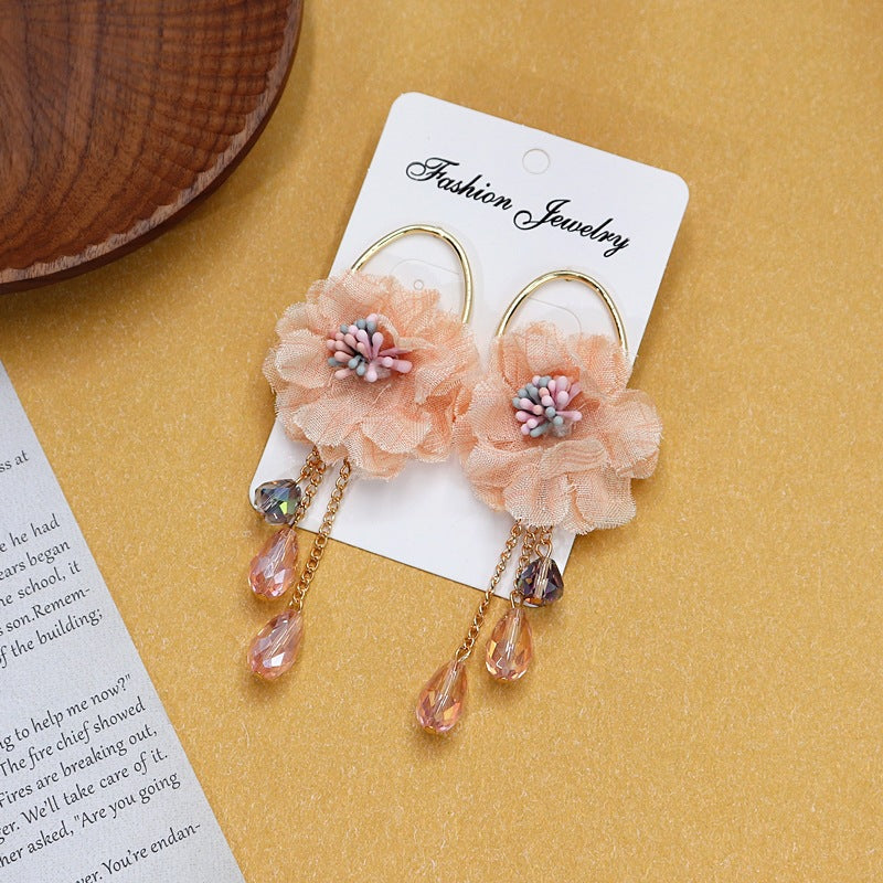 Colorful floral earrings displayed on white background image 3