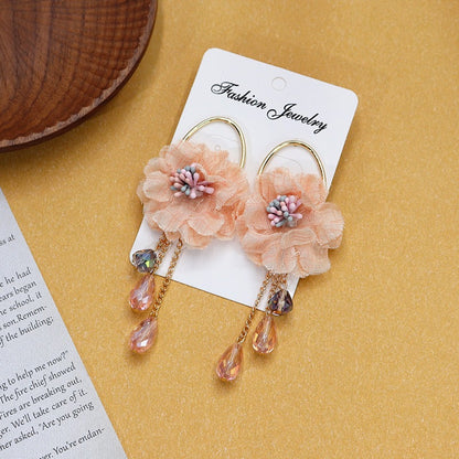 Colorful floral earrings displayed on white background image 3