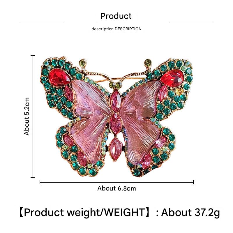 Fashion jewelry brooch with animal motifs