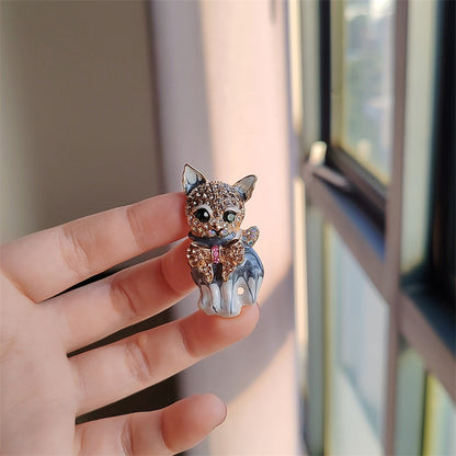 Trendy cat motif brooch on a jacket
